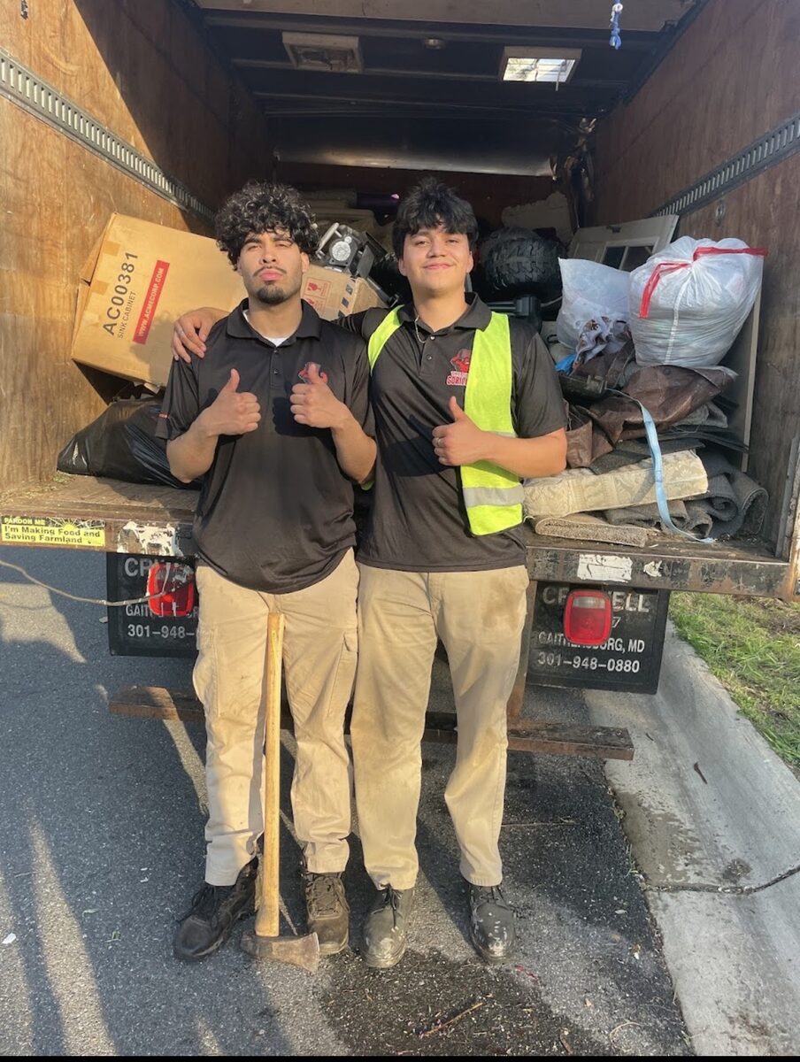 The Junk Gorillas team with loaded truck